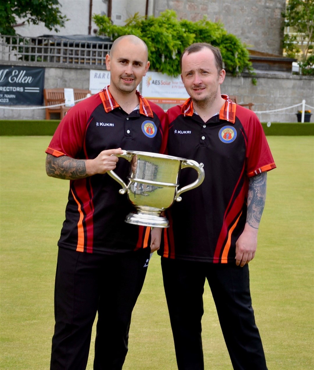 Andrew Adamson and Duncan Adamson pictured with the trophy.