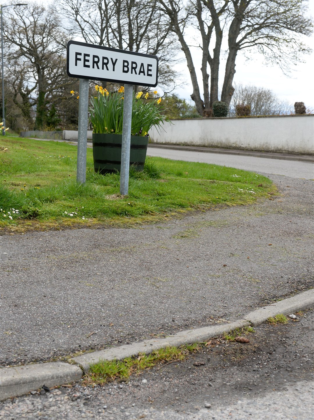North Kessock resident Paul Ovenstone highlights accessibilty issues for wheelchairs.Narrow and poorly maintained drop kerb on Ferry Brae and Millbank Junction.Picture Gary Anthony.