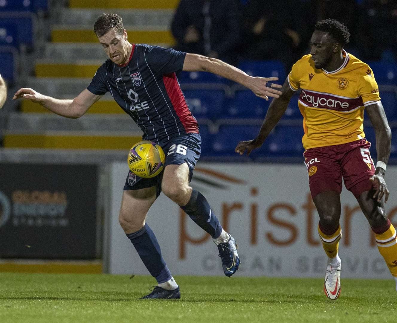 Picture - Ken Macpherson. Ross County(3) v Motherwell(1). 18.01.22. Ross County's Jordan White gets away from Motherwell's Bevis Mugabi.