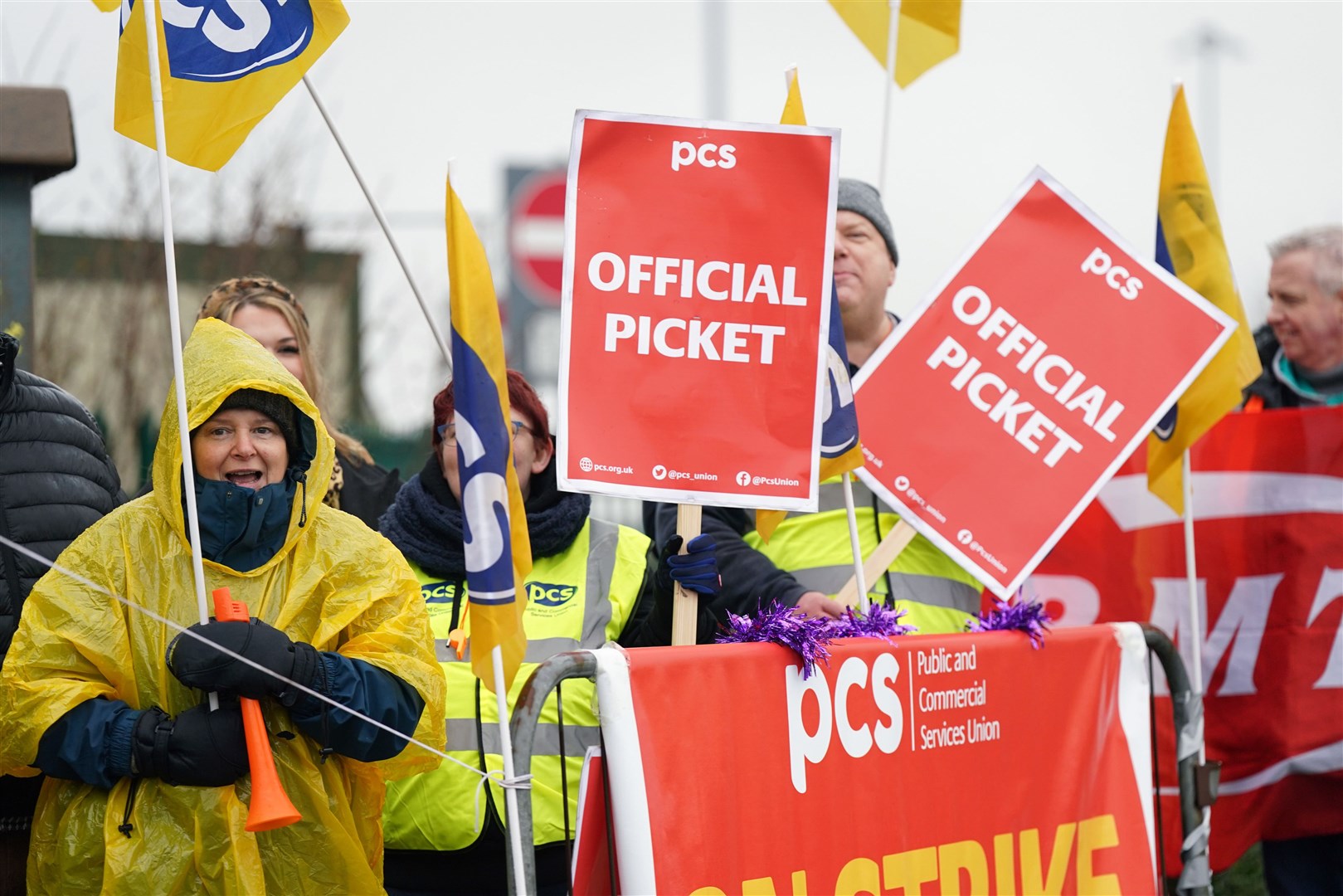 Members of the Public and Commercial Services union on the picket line outside Birmingham Airport (Jacob King/PA)