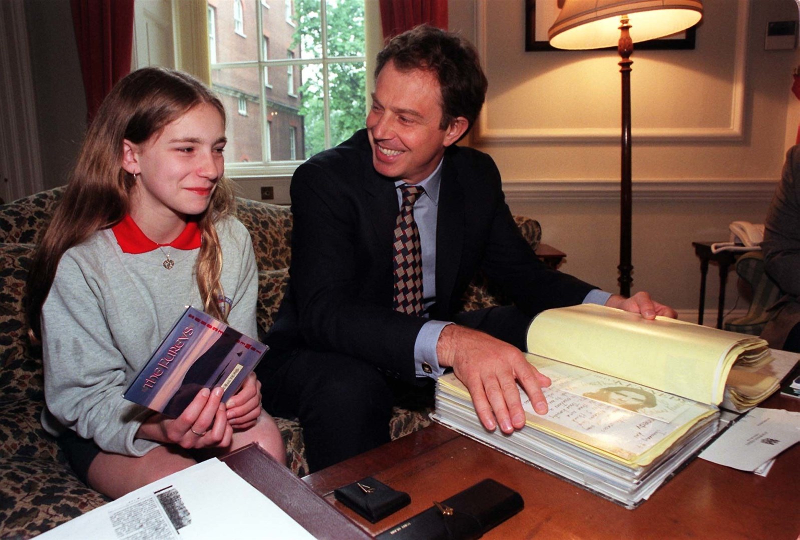 Belfast schoolgirl Margaret Gibney with Prime Minister Tony Blair inside 10 Downing Street in 1997 (Peter Jordan/PA)