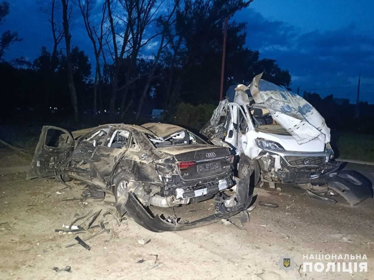Two destroyed cars after Russian tank fire.