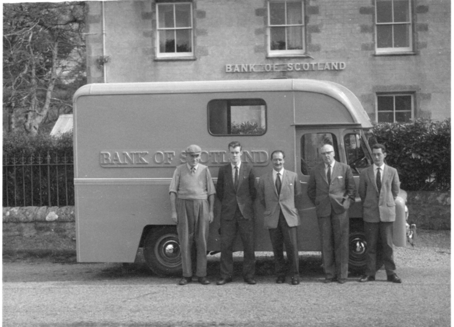 Bank of Scotland van, with Donnie Fraser, Calum Buchanan, Hugh Munro, Calum Macdonald, and Neil Mackay. Picture: Gairloch and District Museum.