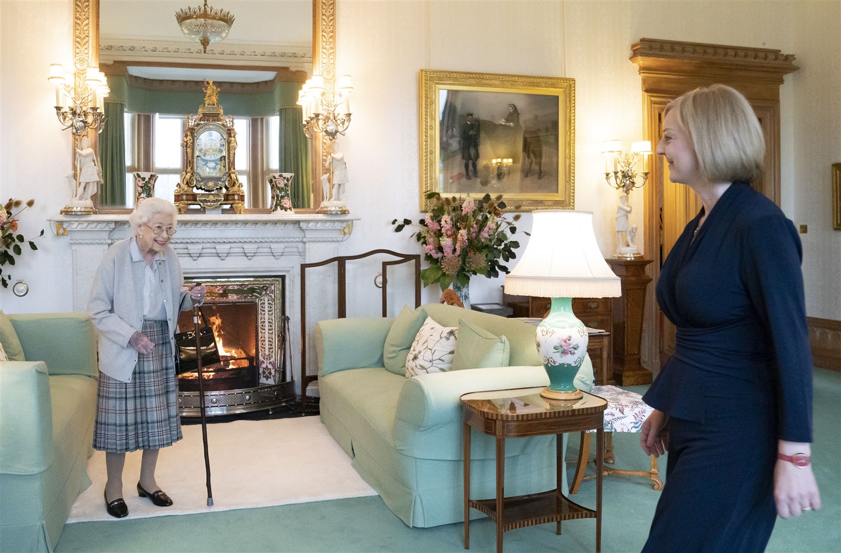 The late Queen greeting Liz Truss in her sitting room at Balmoral Castle for the audience (Jane Barlow/PA)