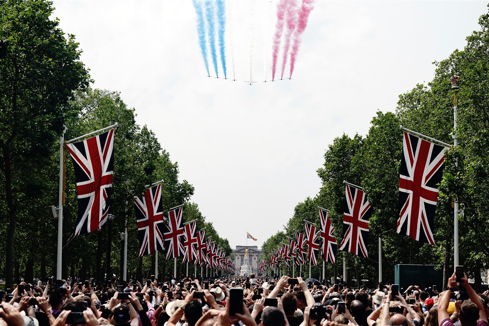 The flypast over The Mall included the Red Arrows (Aaron Chown/PA)