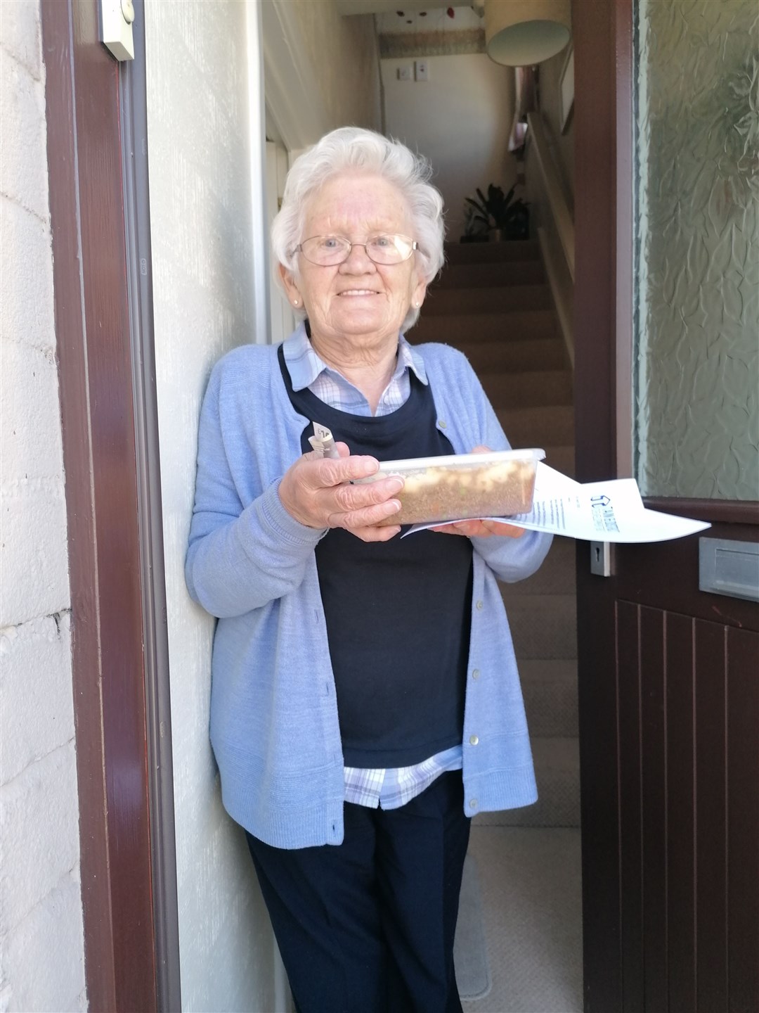 Mina MacDonald with a meals on wheels delivery.