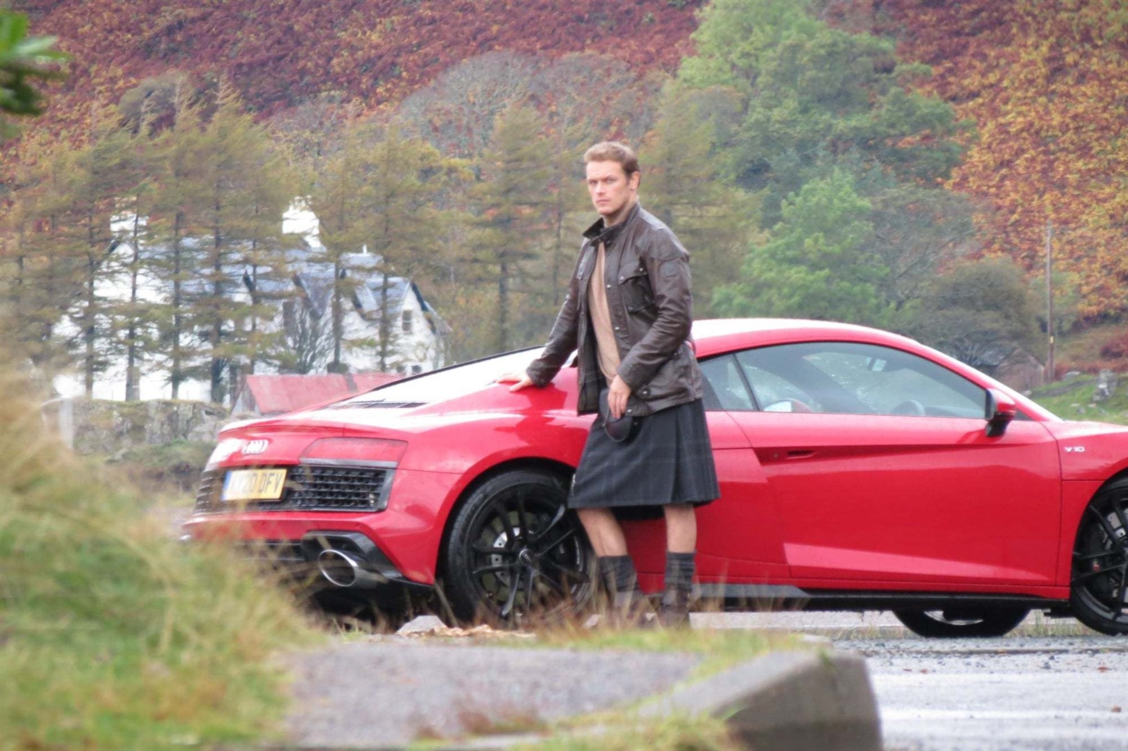 Mr Heughan looked as though he wa enjoying the Highlands.