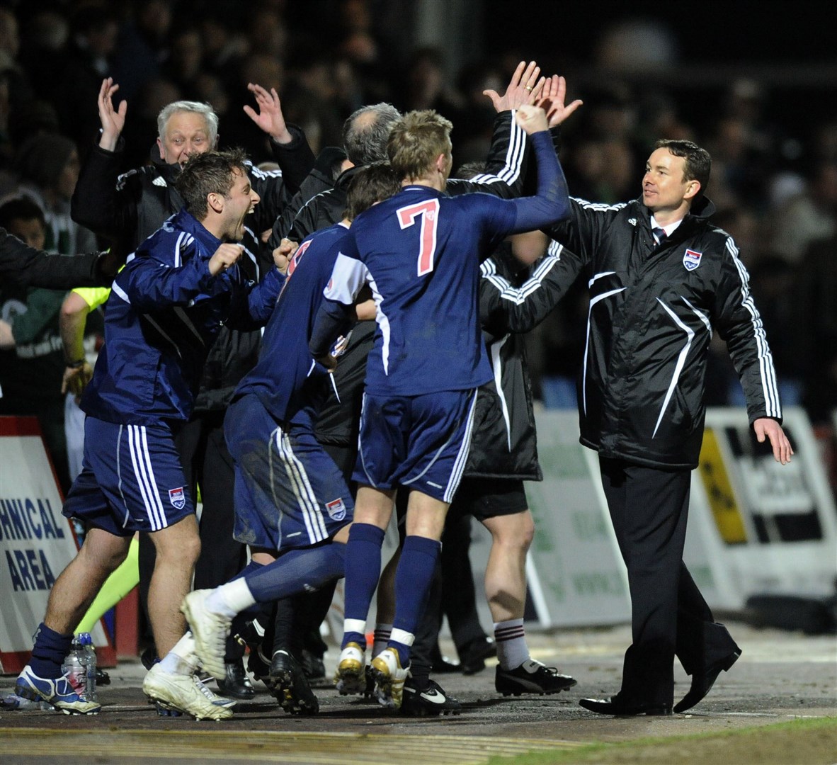 Derek Adams celebrates with his Ross County squad en-route to the Scottish Cup final in 2010. Picture: Ken Macpherson