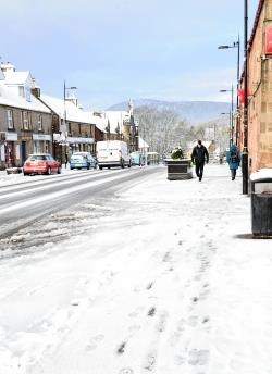 After the record temperatures recorded in some parts of the Highlands last week, Alness High Street was looking somewhat wintry on Tuesday. Picture: Alison White.
