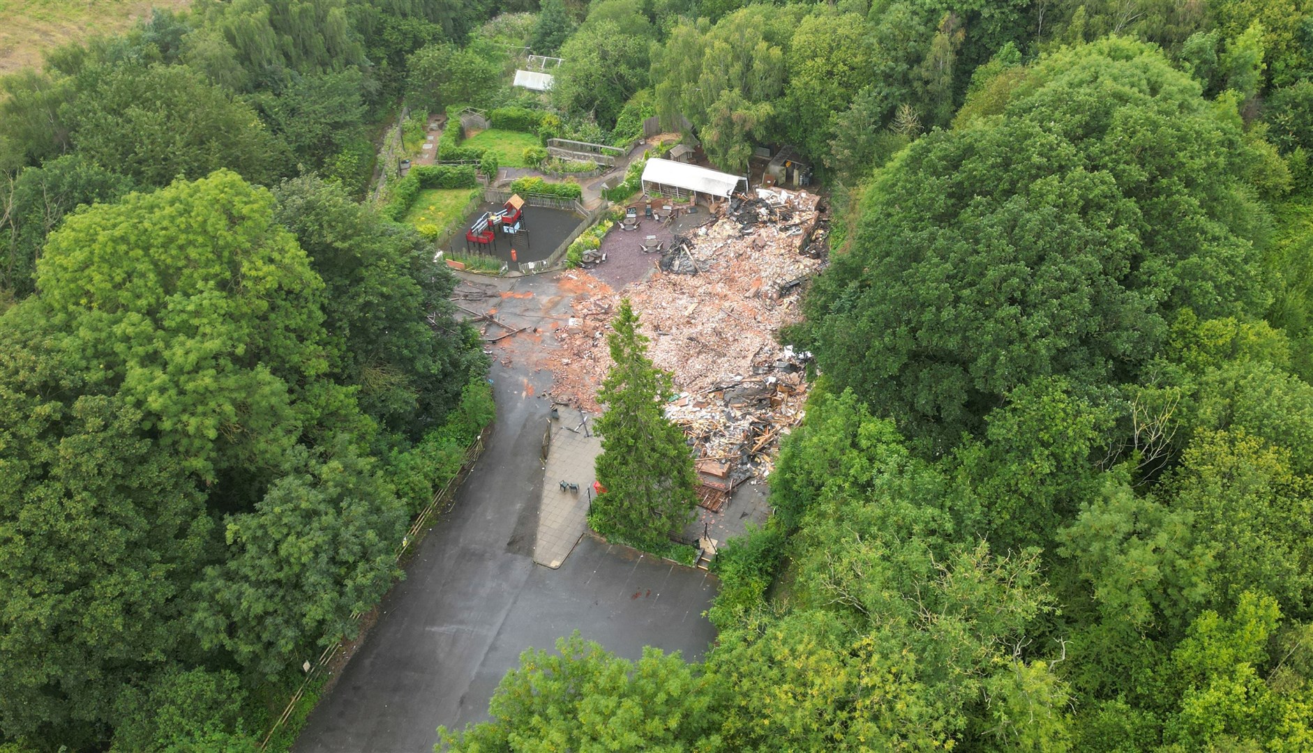 The remains of The Crooked House pub seen from the air (David Davies/PA)