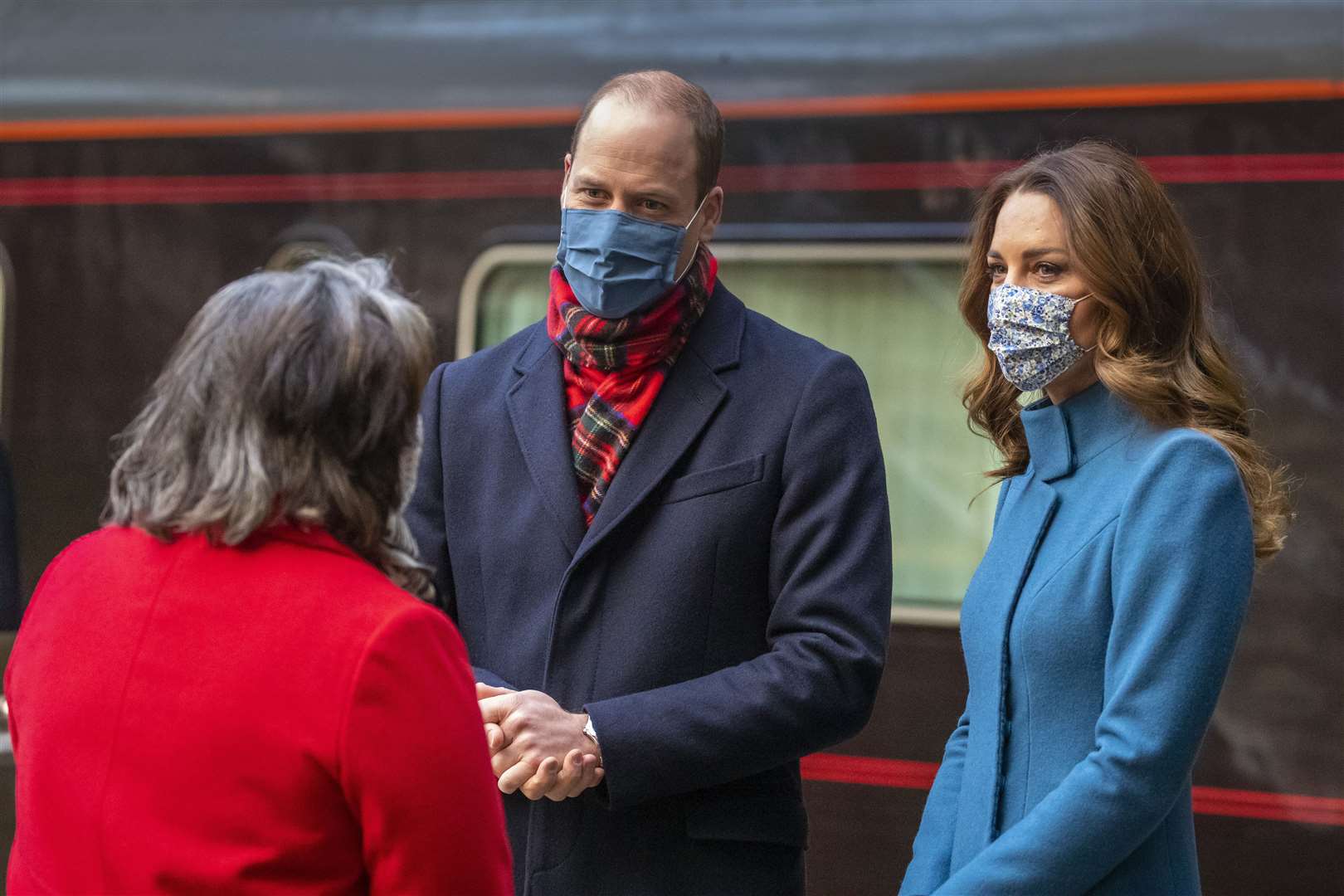 The Duke and Duchess of Cambridge are met at Edinburgh Waverley Station (Andy Barr/PA)