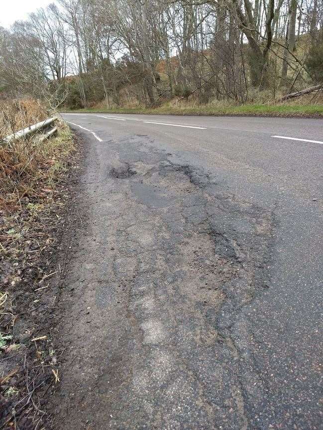 The crumbling road surface on the A832 at the Fairy Glen.