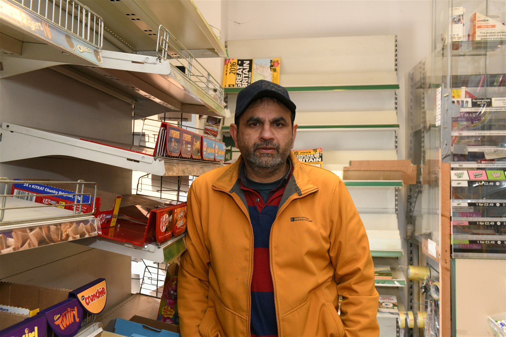 Munawar Ahmad is having to close his city centre shop after 13 years. Picture: Callum Mackay.