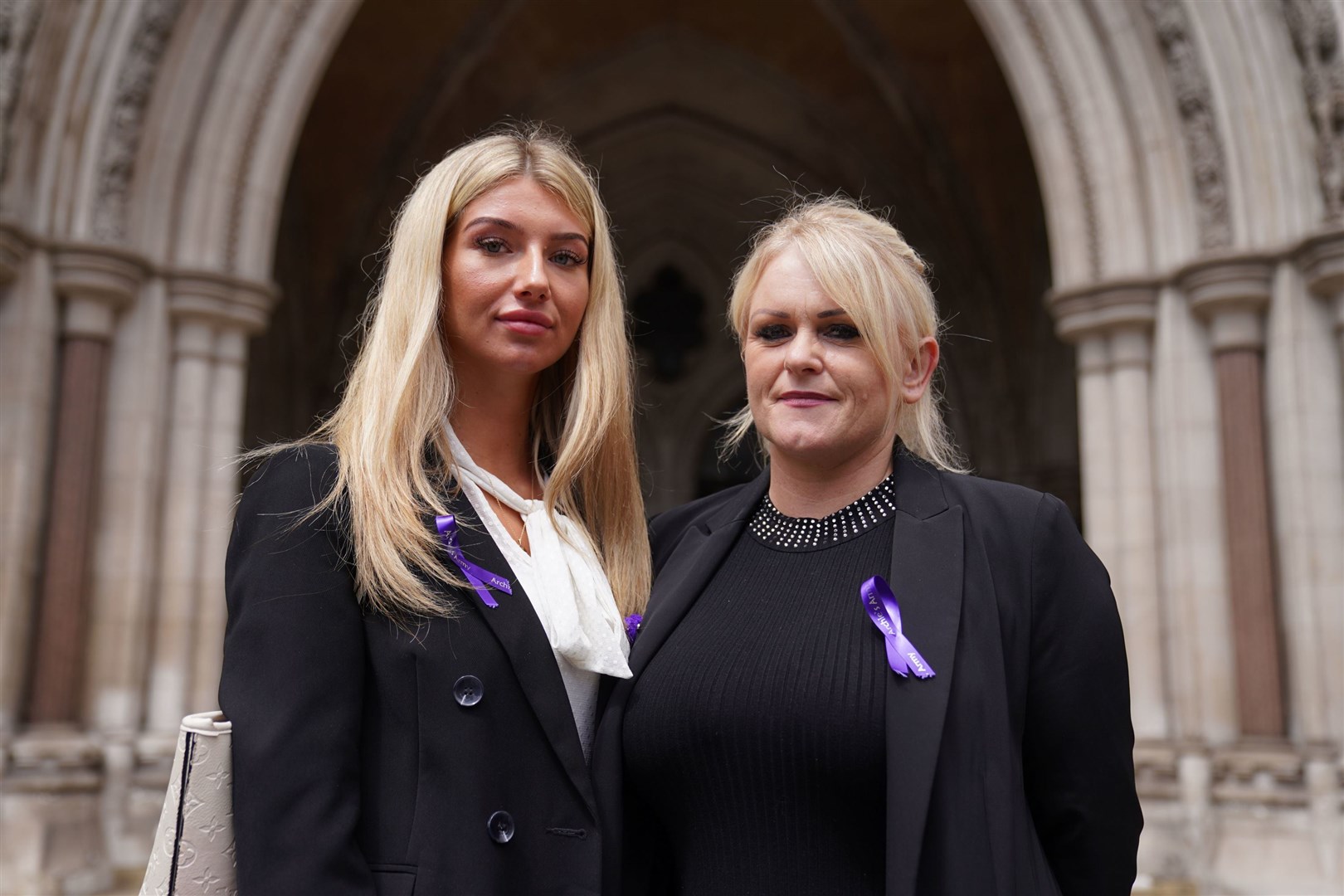 Archie Battersbee’s mother, Hollie Dance, right, with family friend Ella Carter outside the High Court in London (Kirsty O’Connor/PA)