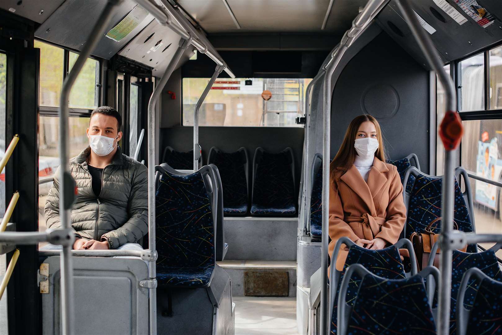 Passengers on public transport during the coronavirus pandemic keep their distance from each other. Protection and prevention covid 19.