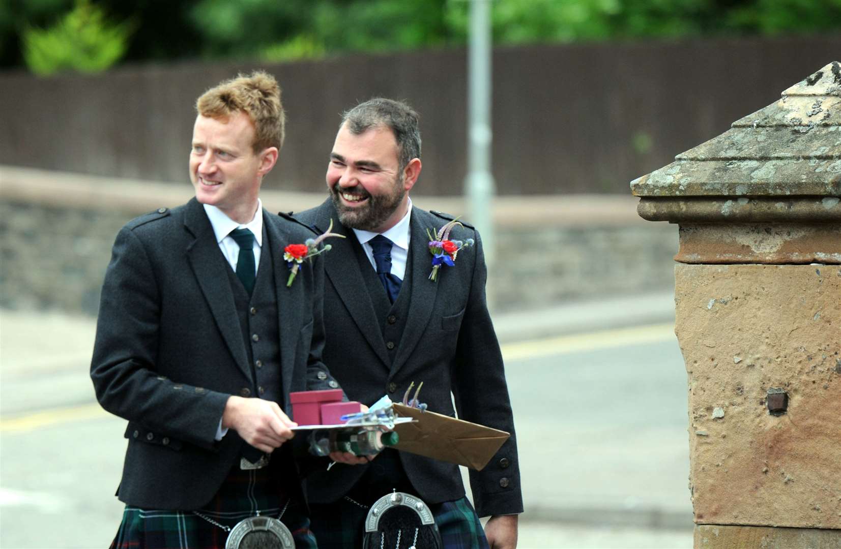 Groom Ali Maclennan (right) was the first to arrive at the church. Picture: James Mackenzie