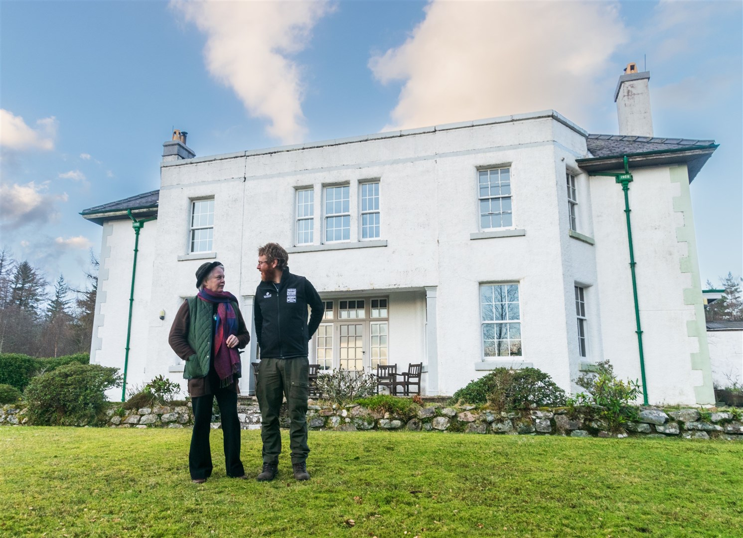 Charity founder Kathryn Rae and Estate Manager Malcolm Turner outside the 95-year old Couldoran House in Wester Ross.