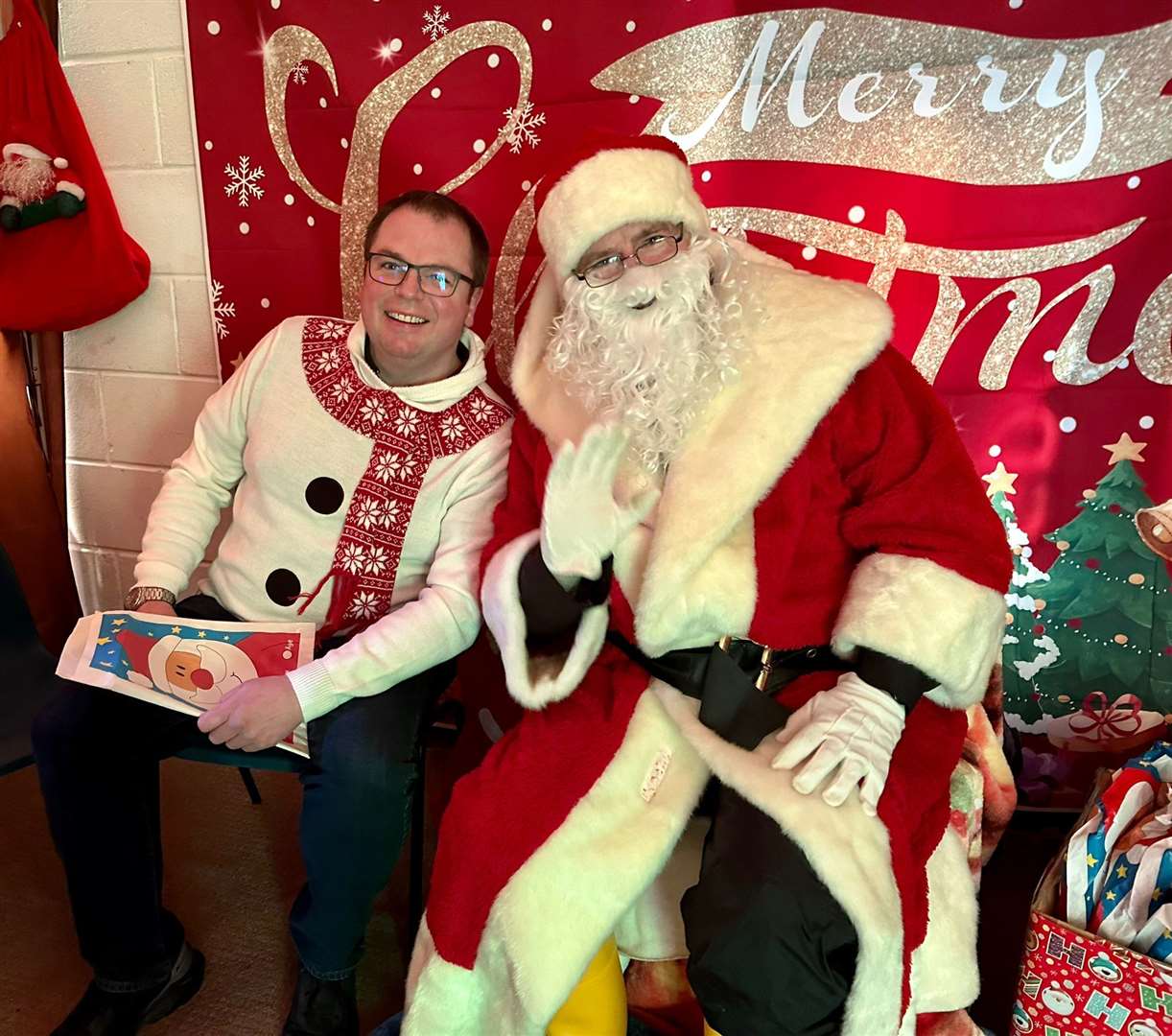 Andrew MacDonald gets a snap with Santa. Picture: Kyle RNLI