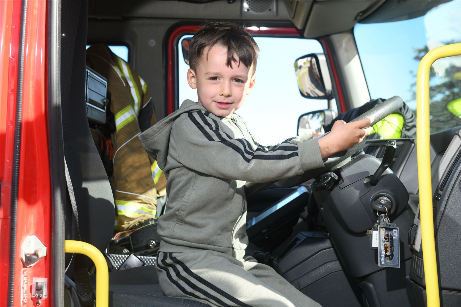 Harris Smillie gets behind the wheel of a fire appliance. Picture: James Mackenzie.