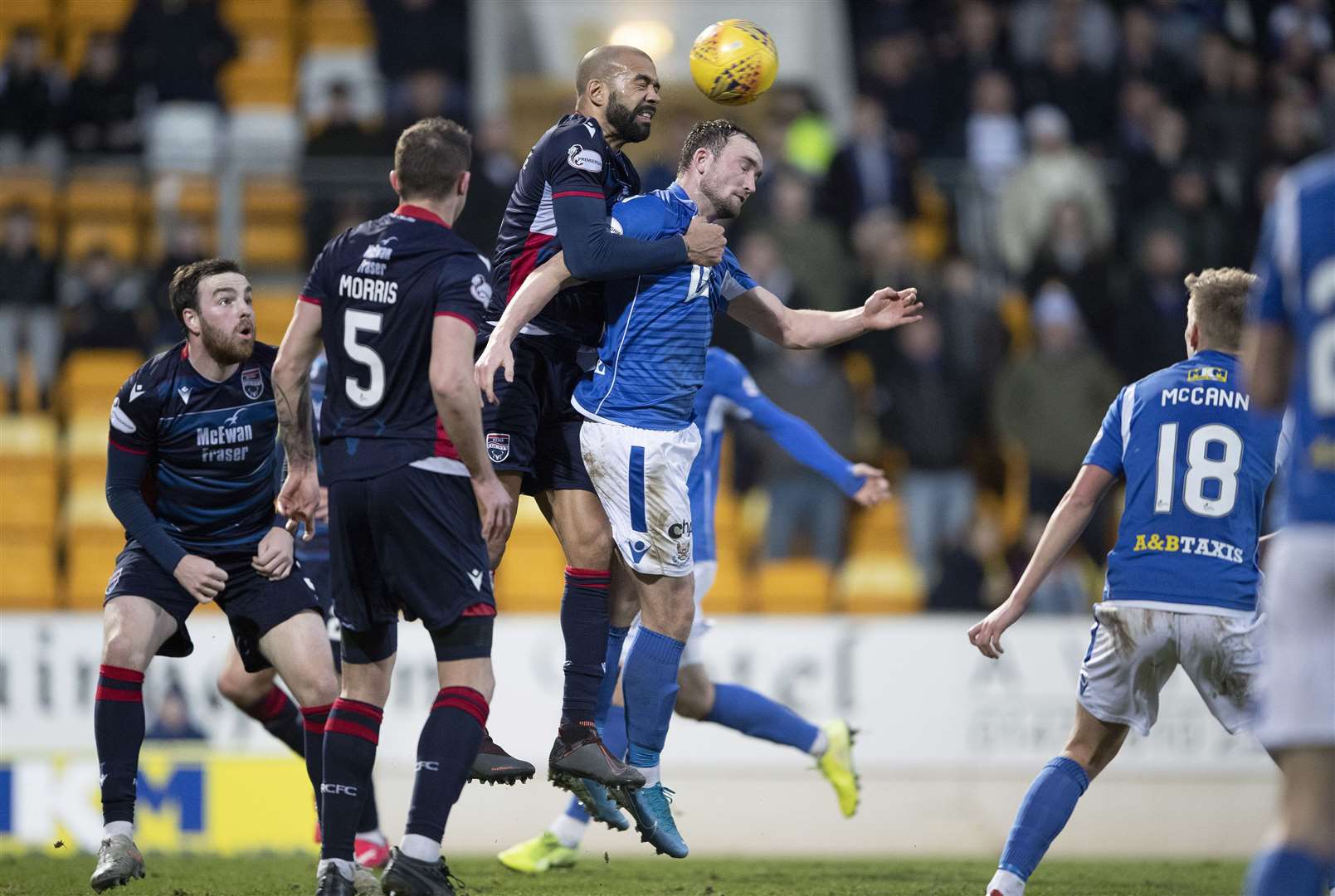 St Johnstone v Ross County…..29.12.19 McDiarmid Park SPFL Liam Fontaine gets above Chris Kane Picture by Graeme Hart. Copyright Perthshire Picture Agency Tel: 01738 623350 Mobile: 07990 594431