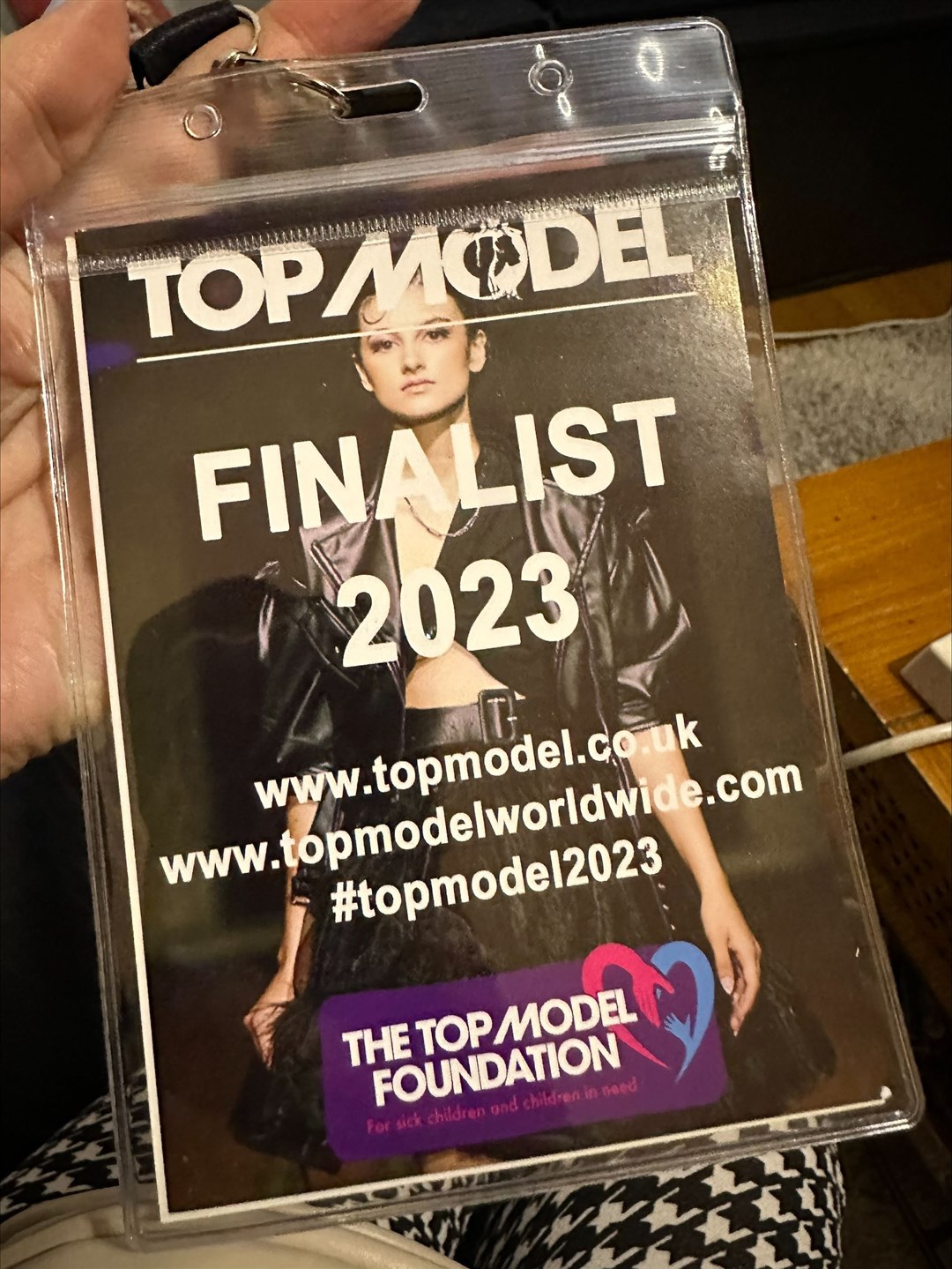 A Top Model UK finalist pass..