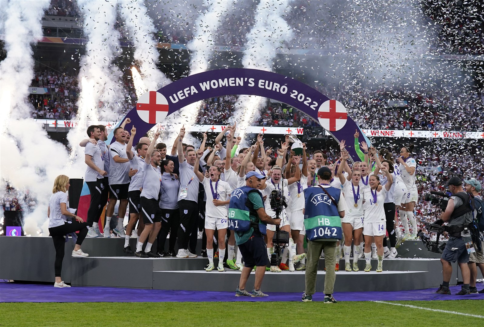 The England team collect the trophy following victory over Germany in the Euro 2022 final on Sunday (Danny Lawson/PA)