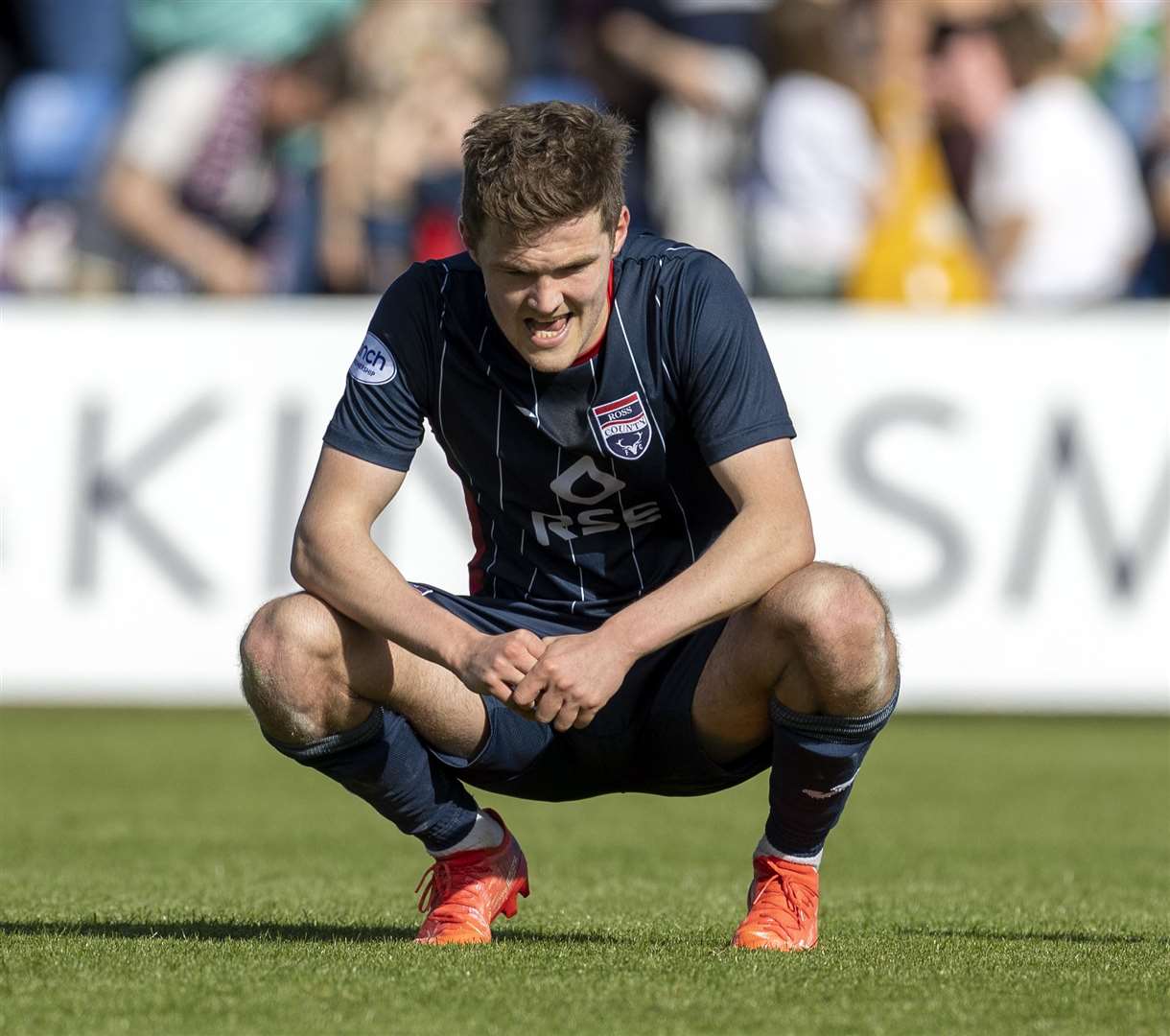 A dejected Blair Spittal after the full time whistle against Motherwell. Picture: Ken Macpherson