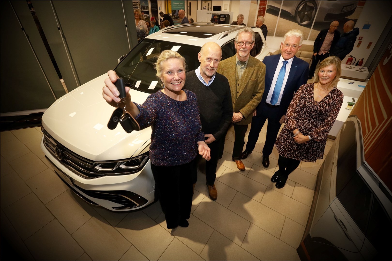 Amanda and Graham Nutt of CCAST Highland with the keys to their new vehicle, alongside Highland Cross representatives Uisdean Maclennan, John Fraser and Elizabeth Christie. Picture: James Mackenzie