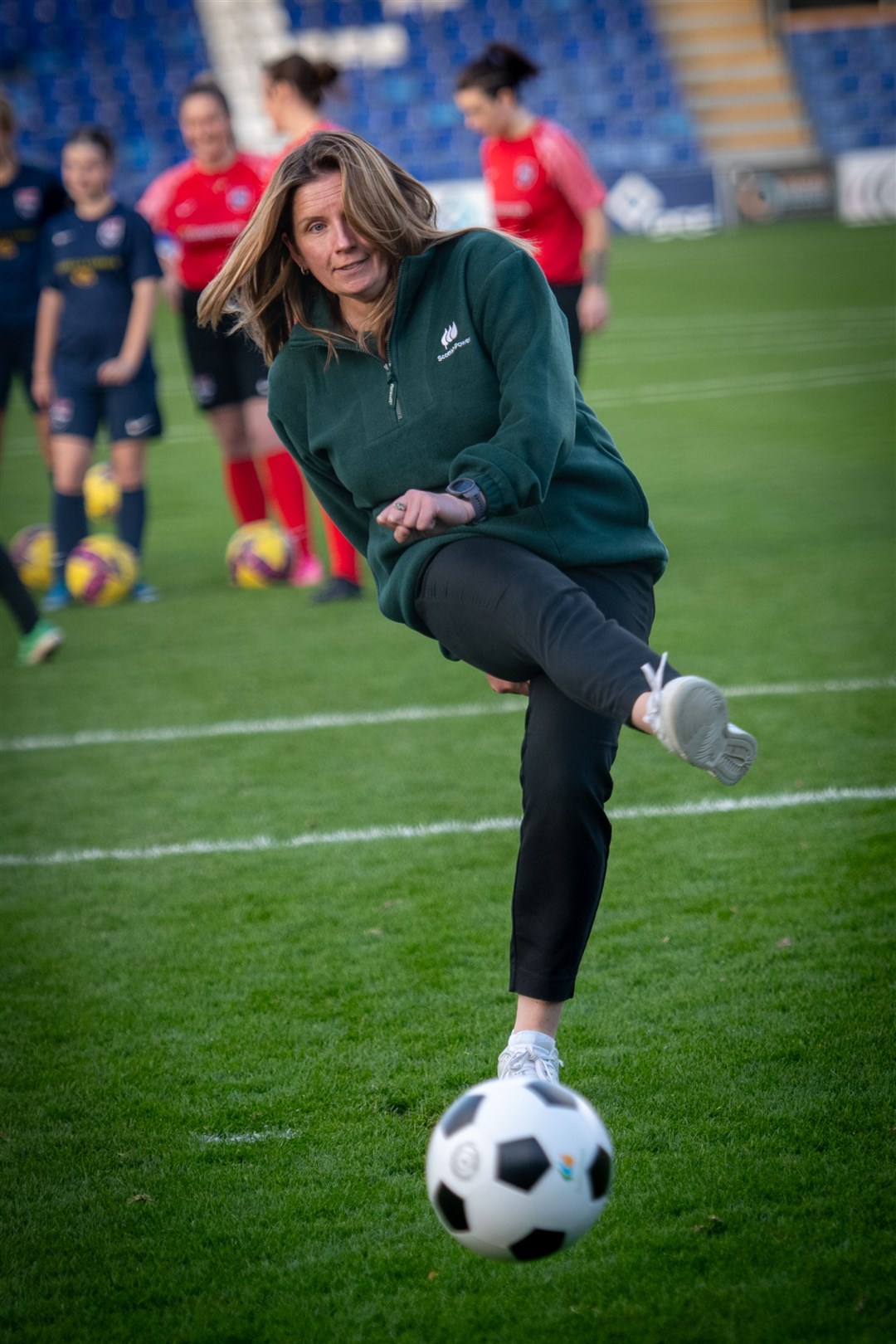 ScottishPower's director of engagement Hazel Gulliver takes a penalty at the Global Energy Stadium. Picture: Callum Mackay
