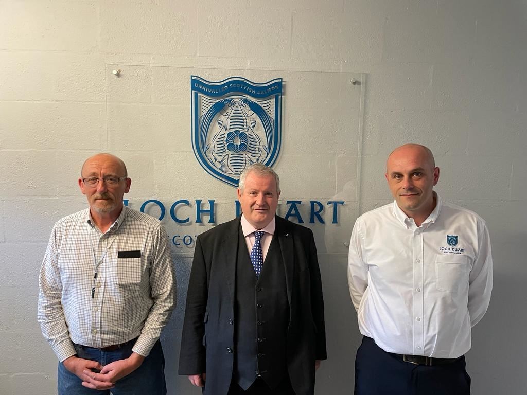 At Loch Duart’s Dingwall processing plant, Alec Macmillan, factory Manager; Ross, Skye & Lochaber MP Ian Blackford; Russell Leslie, Processing Director at Loch Duart