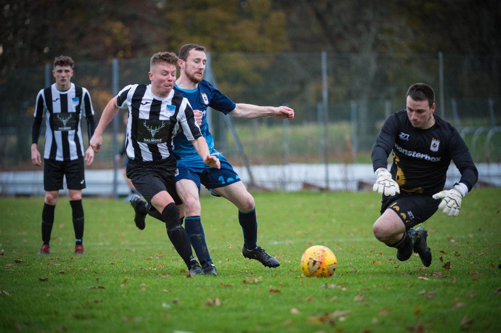 North Caledonian League Div 2..Alness v Lochness..Lochness keeper Michael Miele is first to the ball...Picture: Callum Mackay..