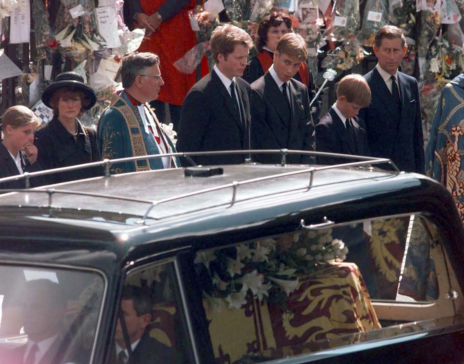 William with his uncle, brother and father at Diana’s funeral in 1997 (Sean Dempsey/PA)