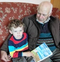 John Murdo Mackenzie reads a story with special personal signifiance to his grandson, also John
