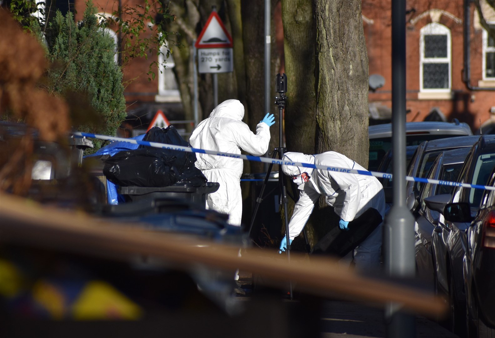 Forensic officers at the scene of the killing (Matthew Cooper/PA)