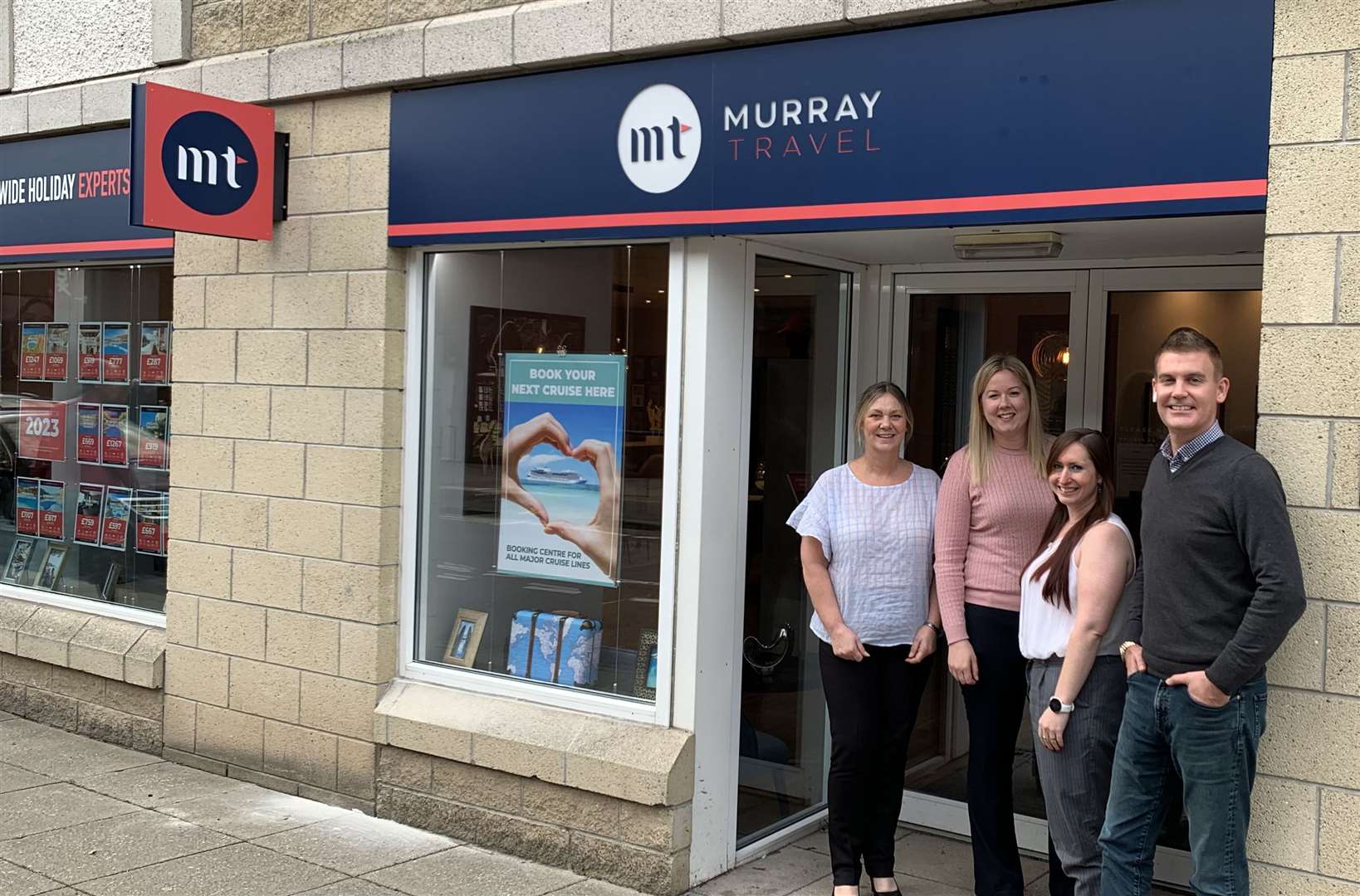 Scott Murray and Inverness team members Tracy Ian, Aimee Morgan and Carla Murdoch, at the rebranded Strothers Lane branch.