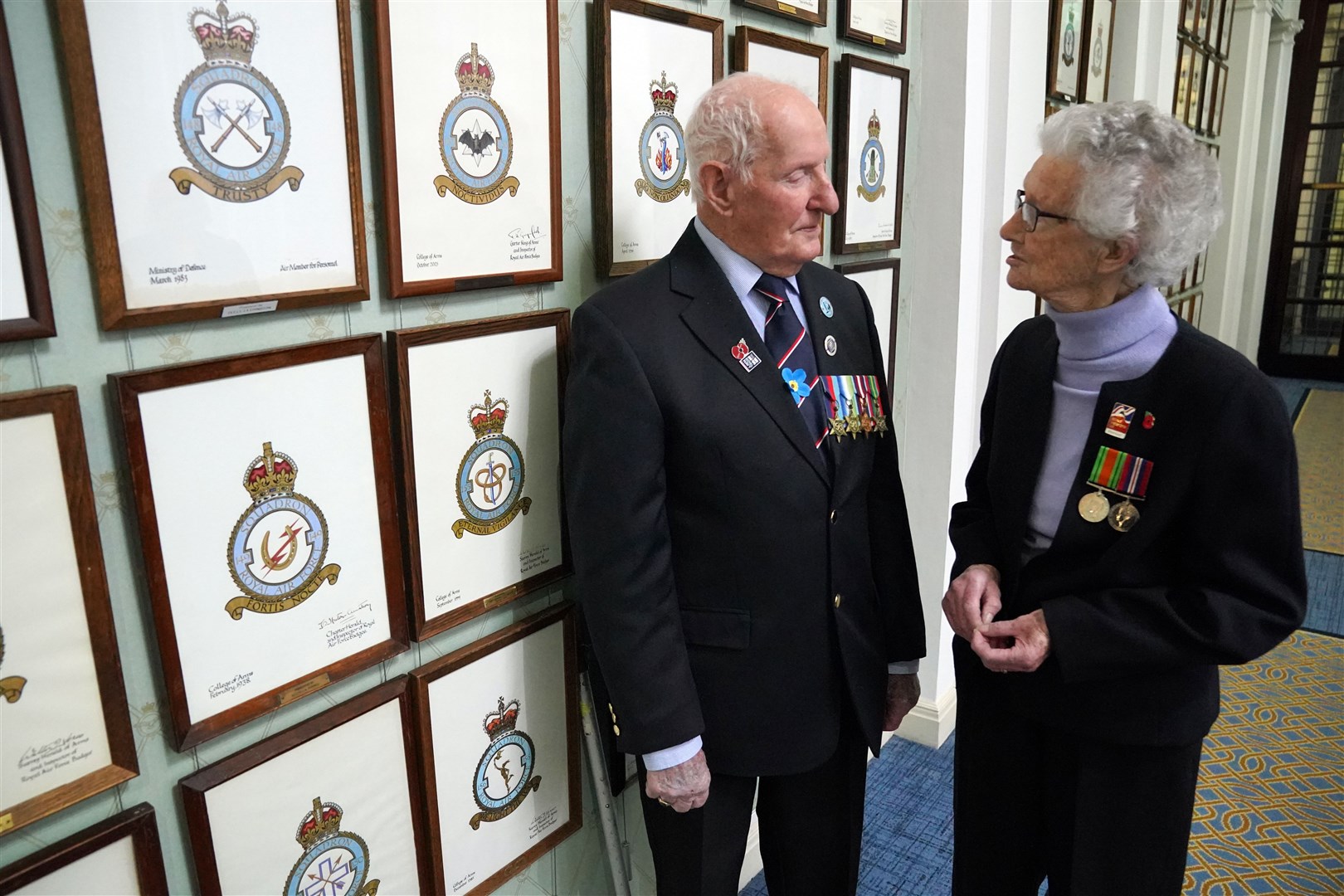 Norrie Bartlett, 96, speaking with Robbie Hall, 99, at the RAF Club in London (Jonathan Brady/PA)
