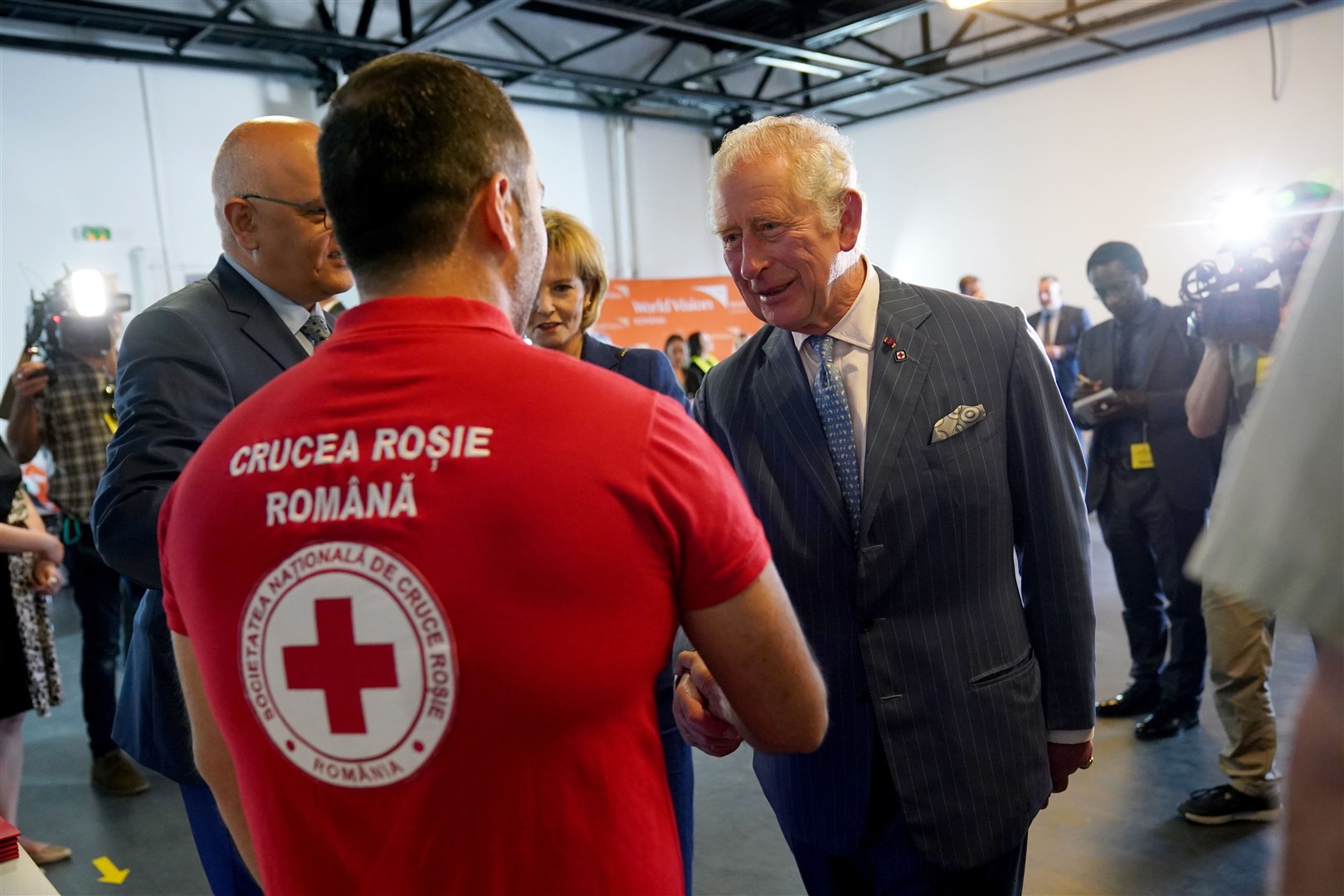 The Prince of Wales meets members of the Red Cross during his visit to the Ukrainian refugee centre in Bucharest, Romania, last year (Yui Mok/PA)