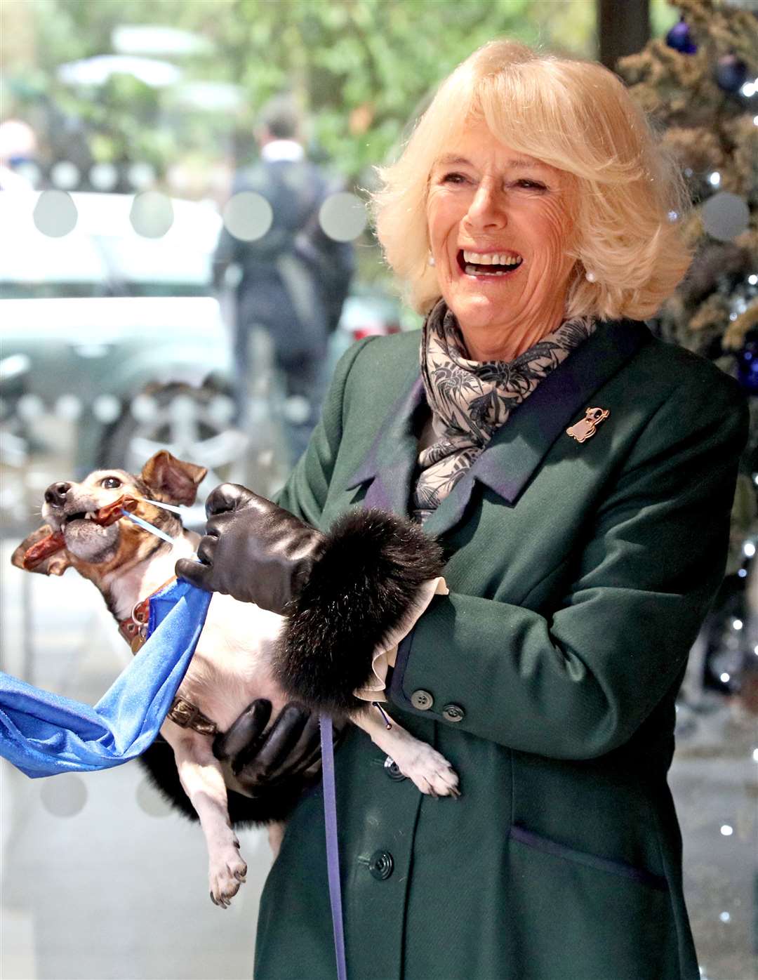 The Duchess of Cornwall with Beth, her Jack Russell terrier, unveiling a plaque at Battersea Dogs and Cats Home (Steve Parsons/PA)