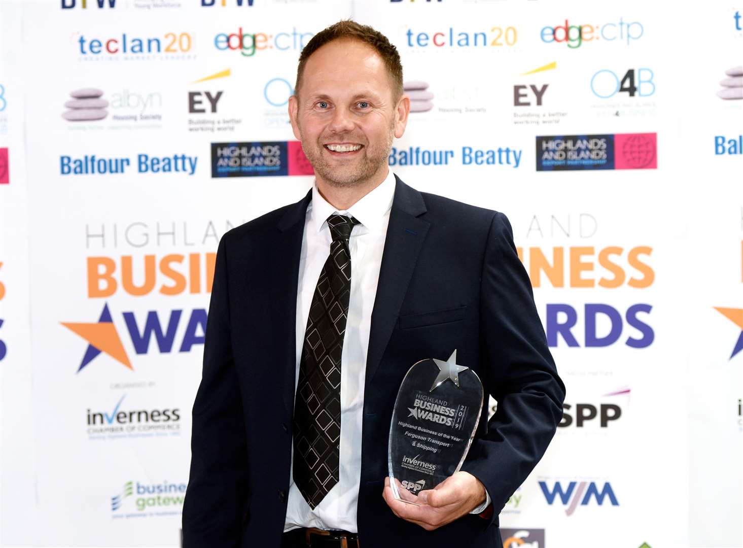 Jack Ferguson, of Ferguson Transport and Shipping, with the Highland Business of the Year award in 2019.