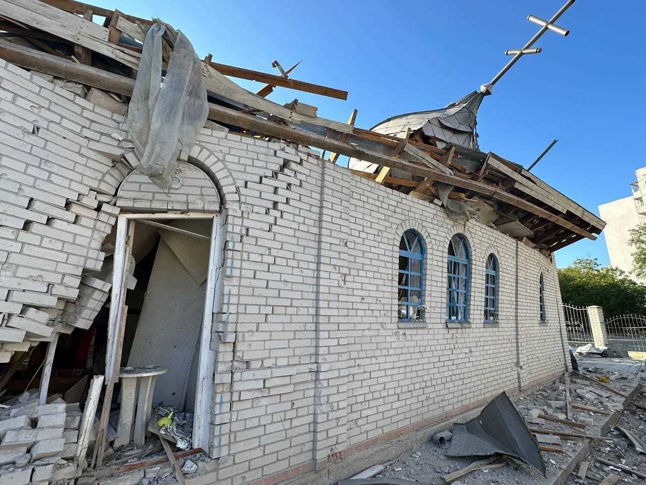 The buckled walls of a church.