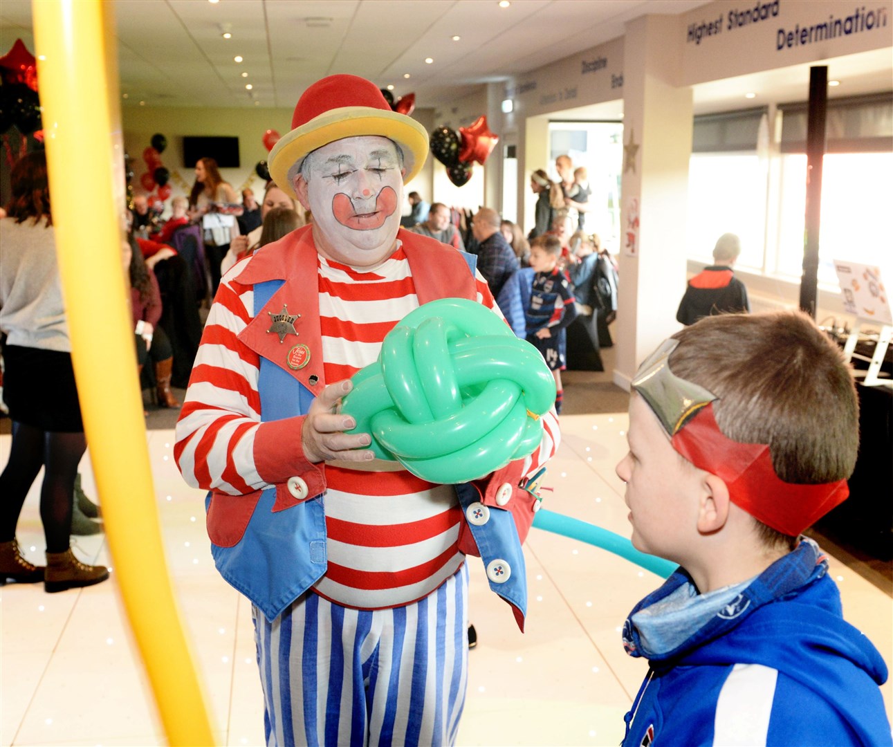 Ross County Brunch with Santa 2019..Bubbles the clown makes a balloon football for the children to play with..Picture: James MacKenzie..