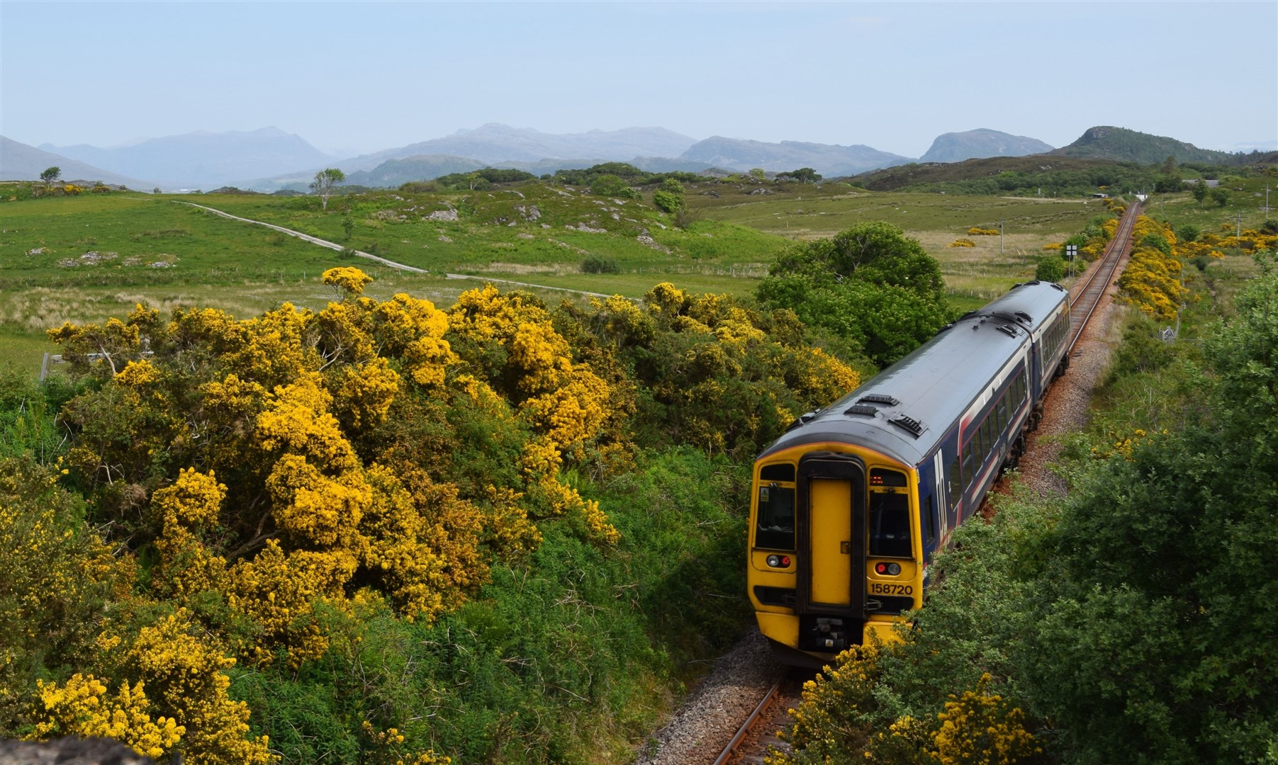 A ScotRail train approaches Duirinish station on the Kyle Line. Picture: Phil Murray.