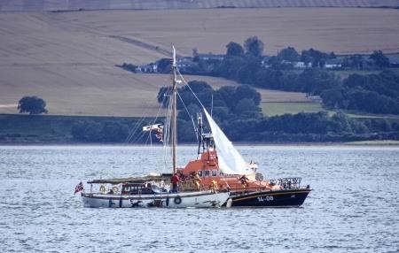 Invergordon lifeboat aids the Norwegian-registered yacht Nora.
