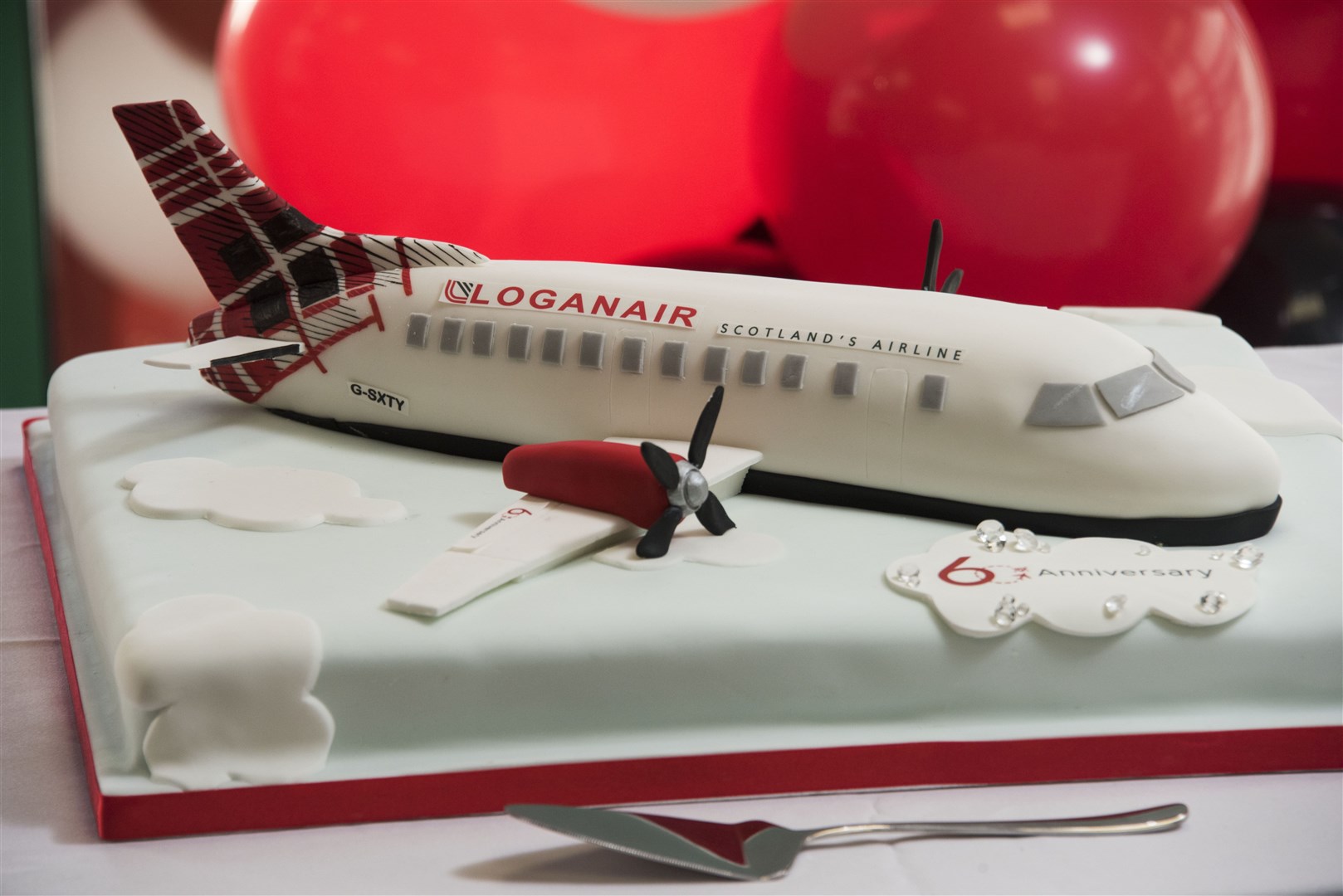 Loganair's very appropriate 60th birthday cake design.