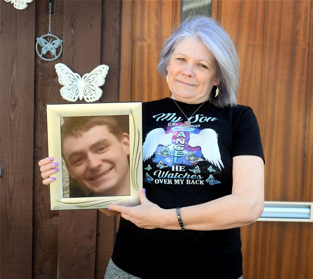 Terri MacDonald with photograph of her late son Ricky Wilson...Picture: Gary Anthony..