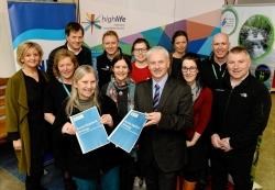 Derek Grieve of the Scottish Government (centre) shows off the Active Highland Strategy along with representatives of public agencies including NHS Highland, Highland Council and the Cairngorm National Park, amongst others.