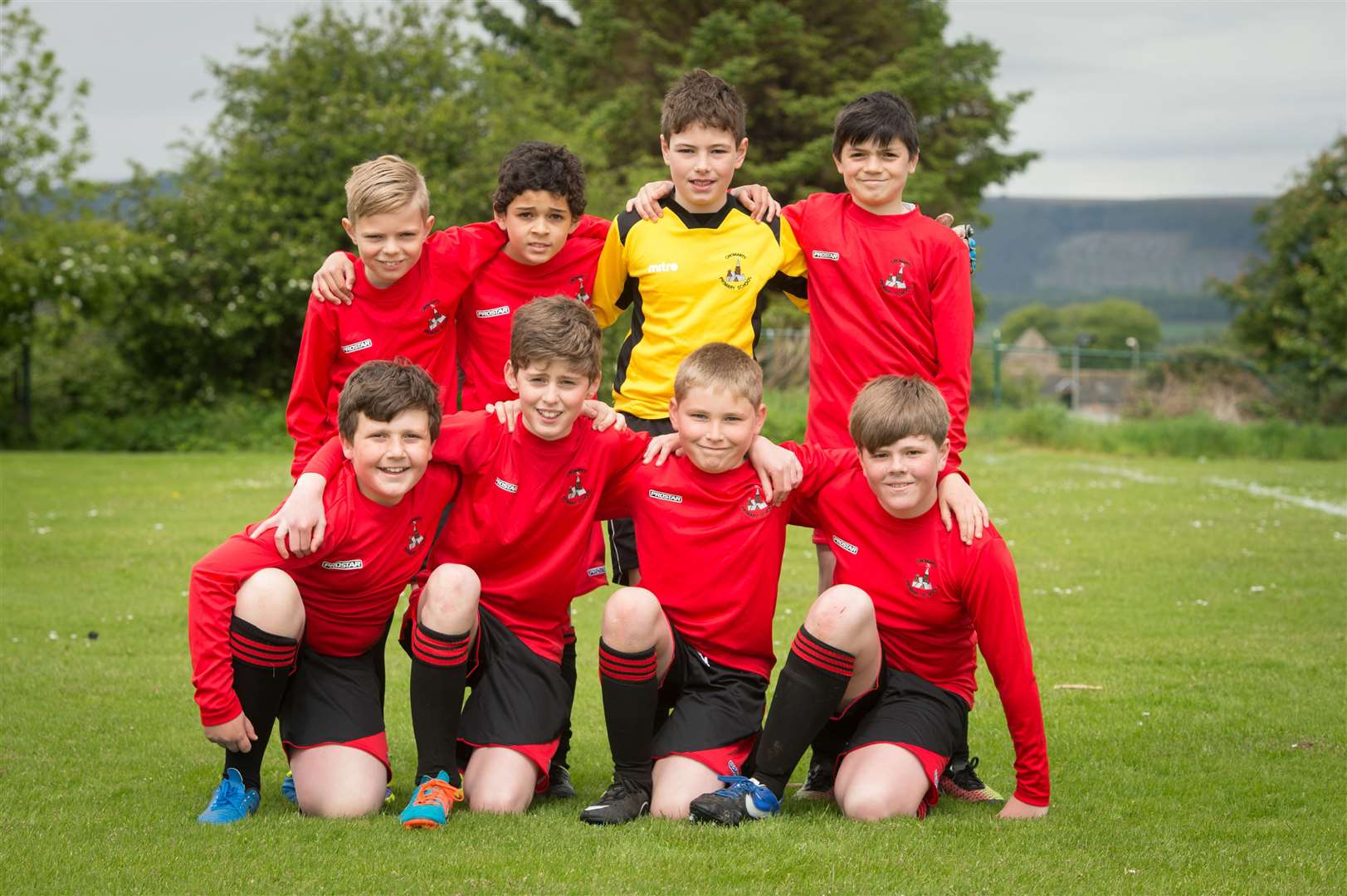 A Cromarty Primary football team lines up in 2015.