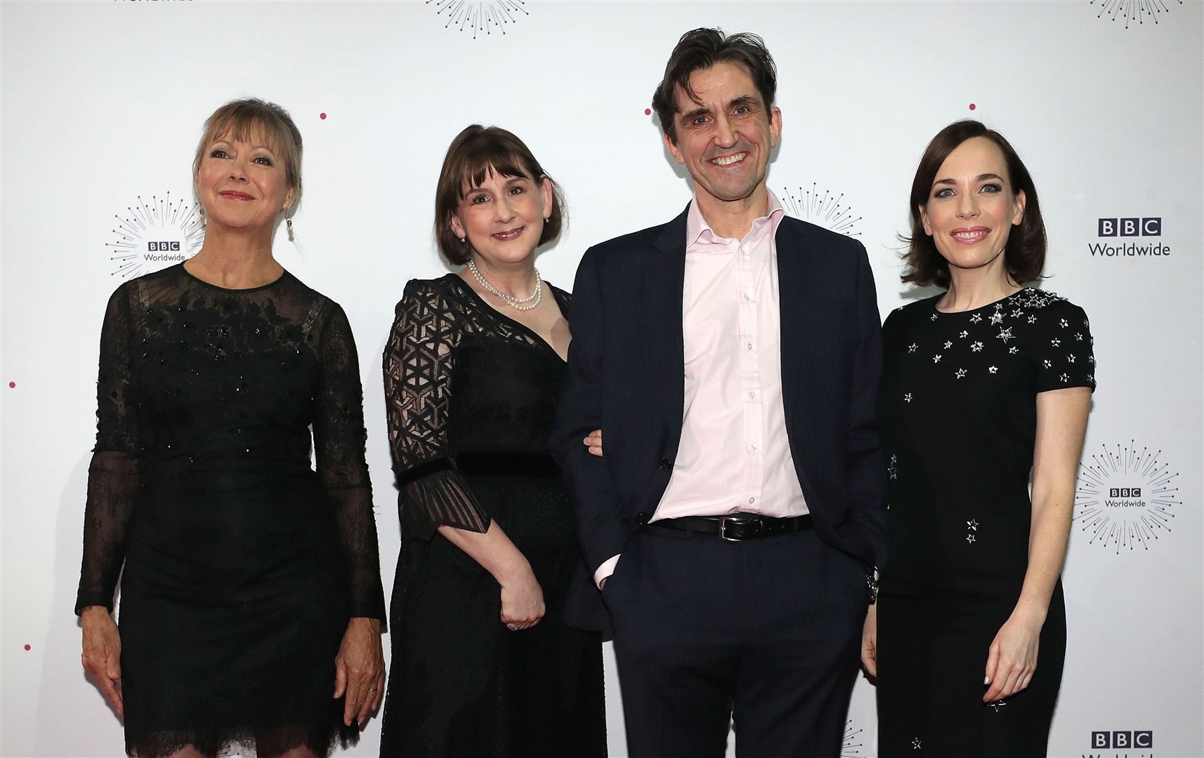 Heidi Thomas with Call The Midwife stars Jenny Agutter (Sister Julienne), Laura Main (Shelagh Turner) and her husband Stephen McGann (Dr Patrick Turner) (Peter Byrne/PA)