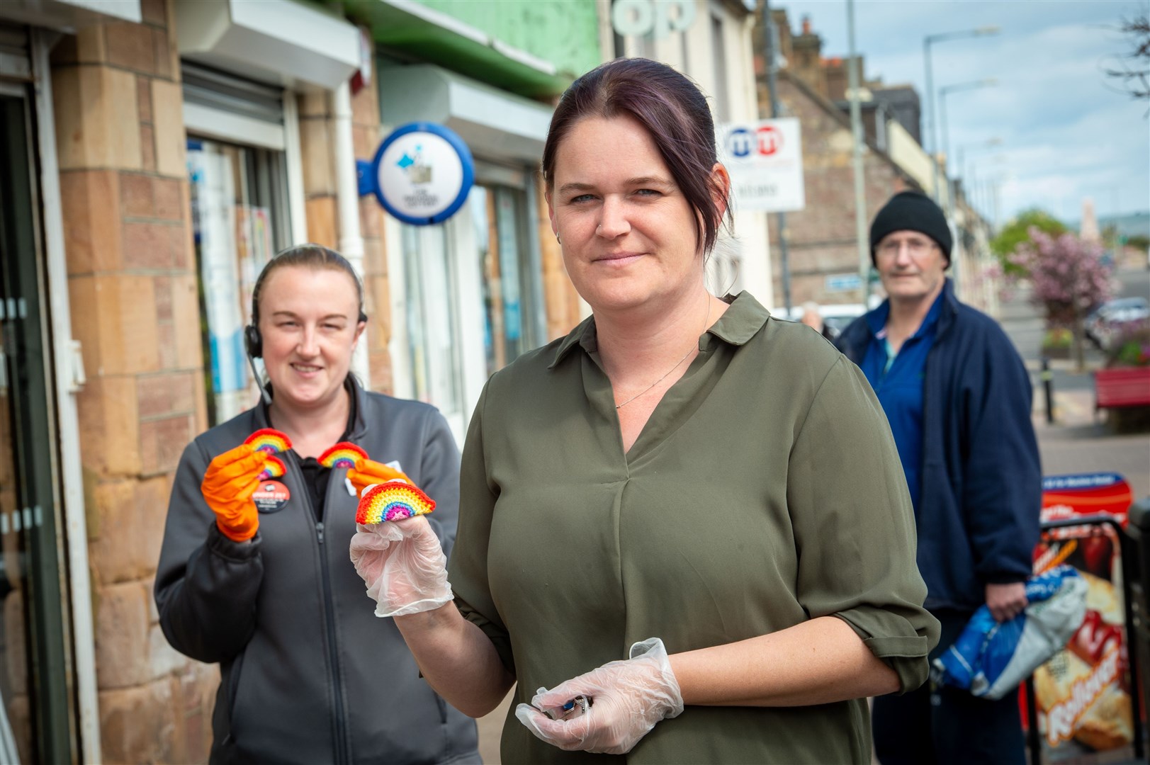 Dana Hogg Sutherland who made the rainbow badges with Vicky Majewski of the Co-op in Invergordon. Picture: Callum Mackay