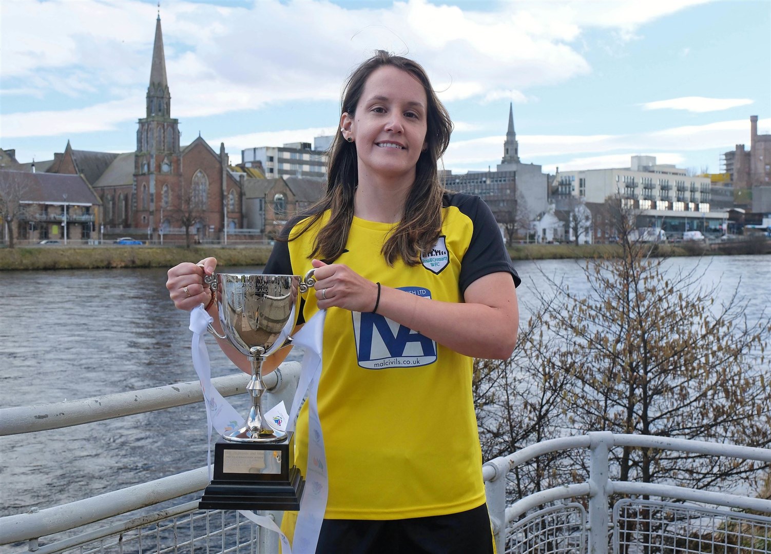 Ross and Cromarty player Lauren Fraser with the Highlands and Islands League trophy at the season's launch event in Inverness earlier this week. Picture: Aimee Todd/Sportpix